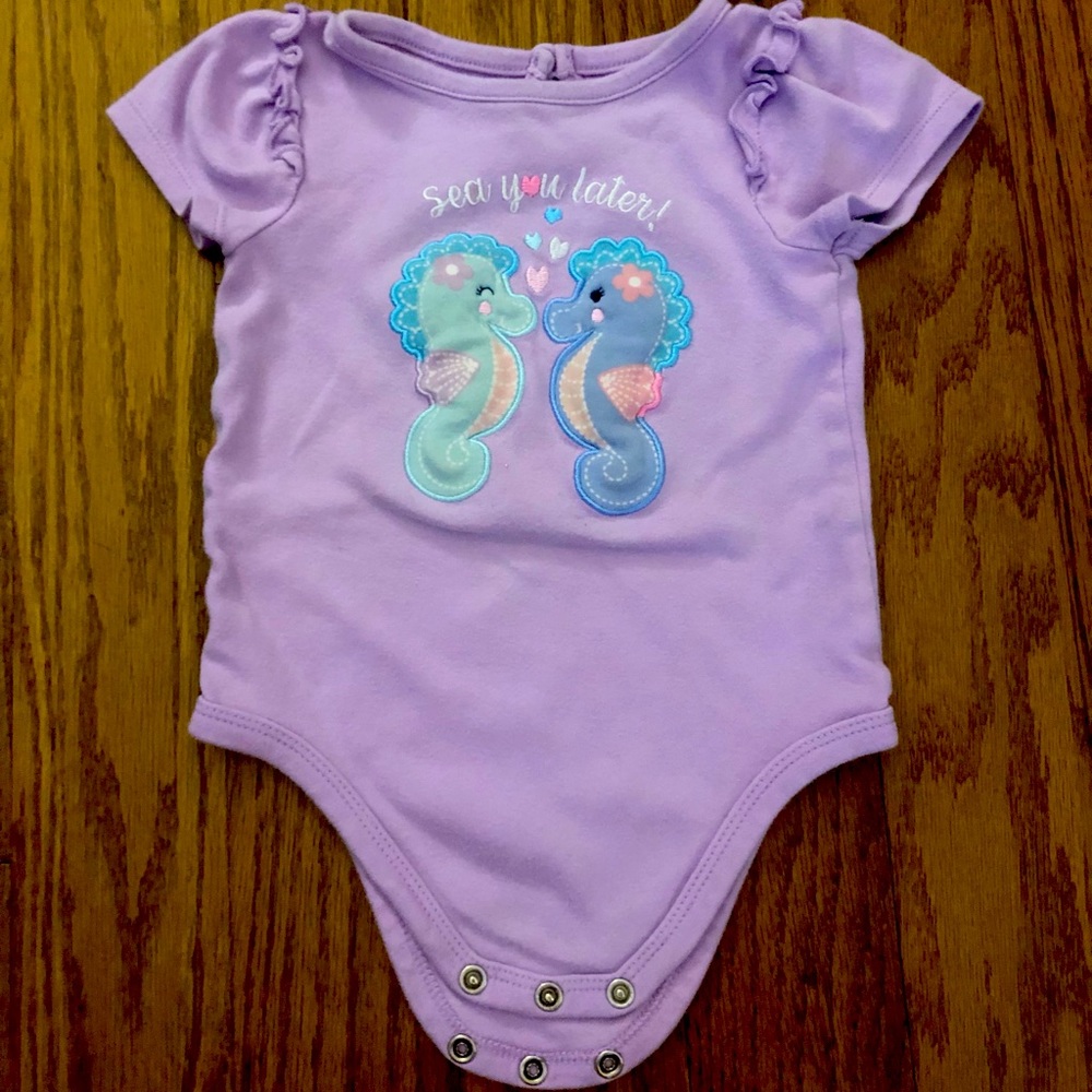 Purple seahorse onesie